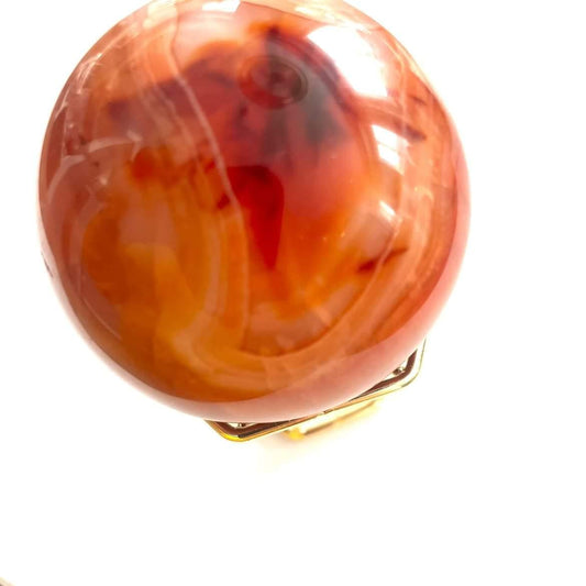 Carnelian shpere with gold stand