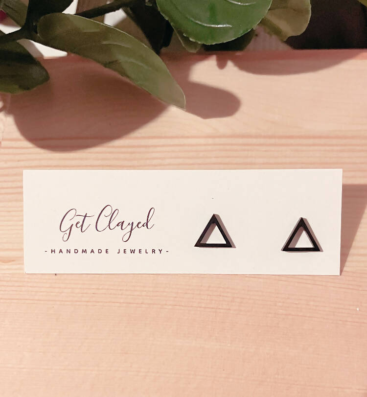 Black triangle studs