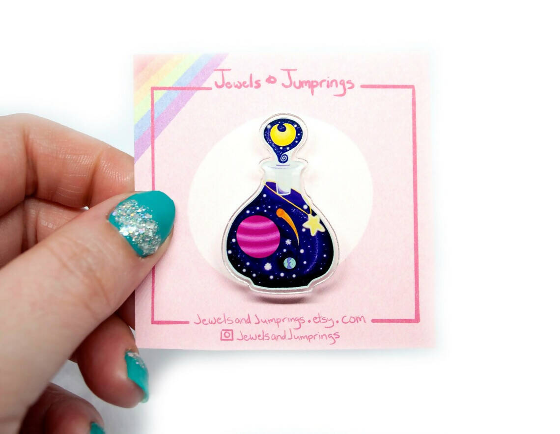 Universe potion bottle acrylic pin